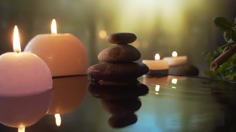 Relaxing Spa Setting with candles and towels